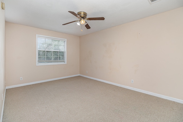 unfurnished room featuring carpet flooring and ceiling fan