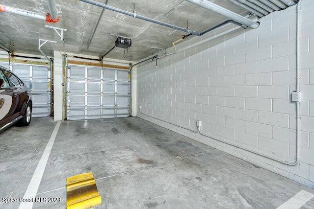 garage featuring a garage door opener