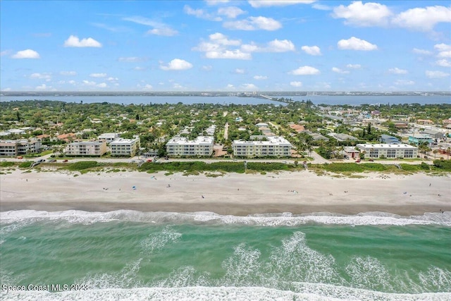 aerial view with a view of the beach and a water view