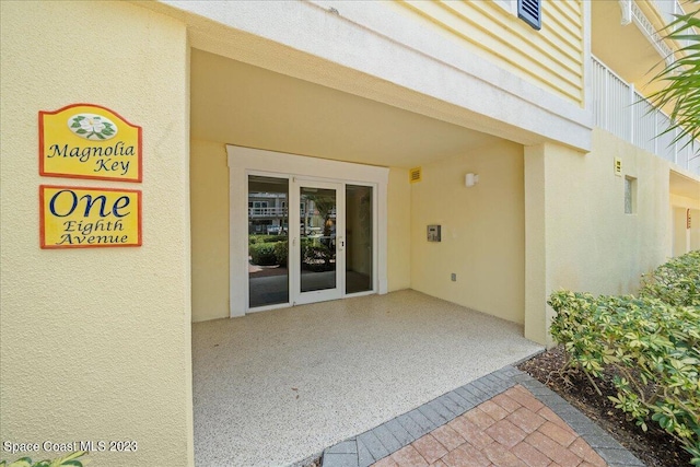 property entrance with a patio