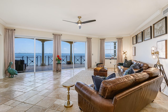 living room featuring ornamental molding, a water view, and ceiling fan