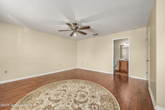 unfurnished room featuring hardwood / wood-style flooring and ceiling fan