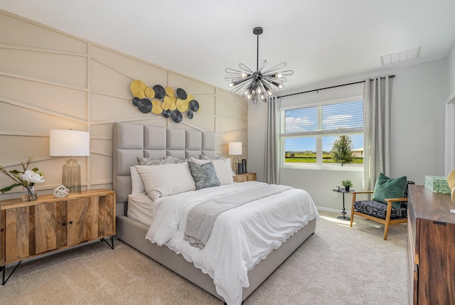 carpeted bedroom with an inviting chandelier and lofted ceiling