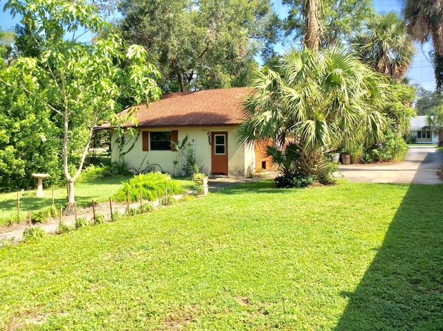 exterior space with a front yard