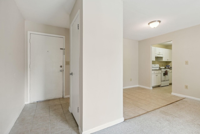 hallway with light tile patterned flooring