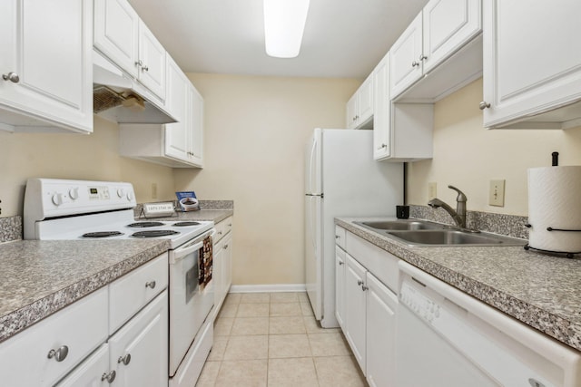 kitchen with sink, white appliances, light tile patterned floors, and white cabinets