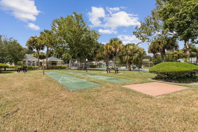 view of community with a lawn