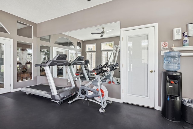 workout area with ceiling fan