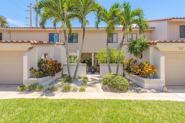 view of front of property with a garage