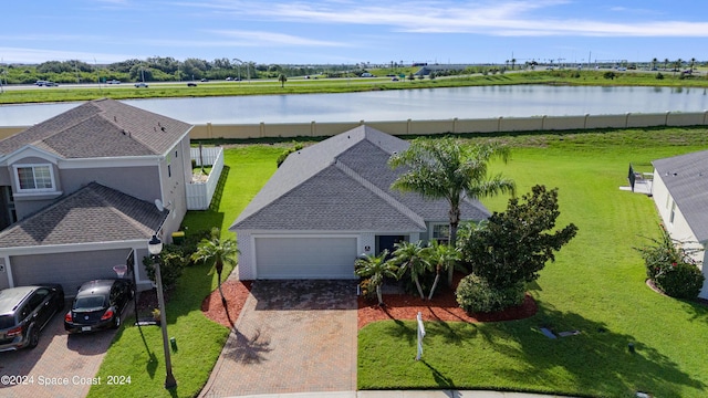 drone / aerial view featuring a water view