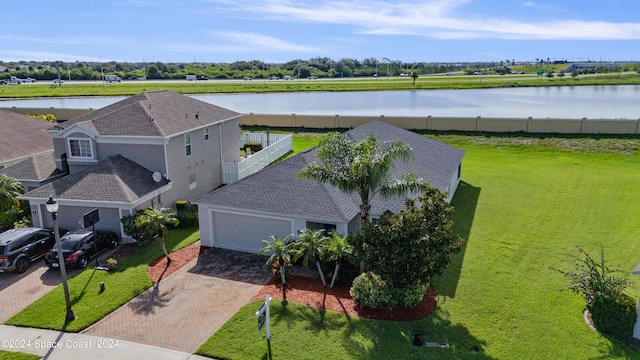 drone / aerial view with a water view