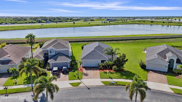 aerial view featuring a water view and a residential view