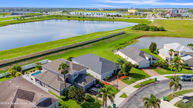 drone / aerial view with a water view