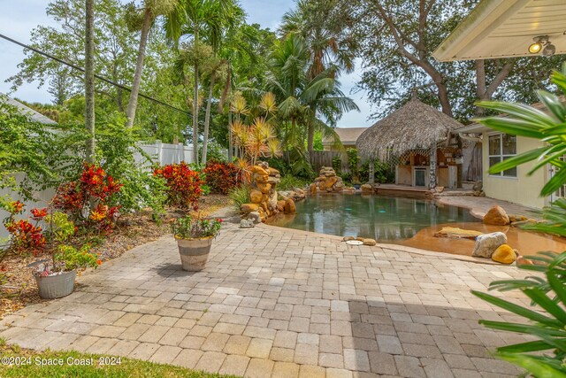 view of pool featuring a patio area