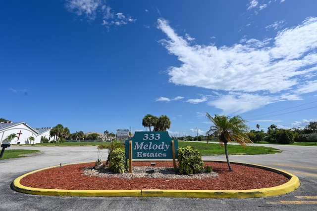 view of community sign