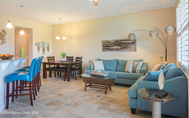 living room featuring a chandelier