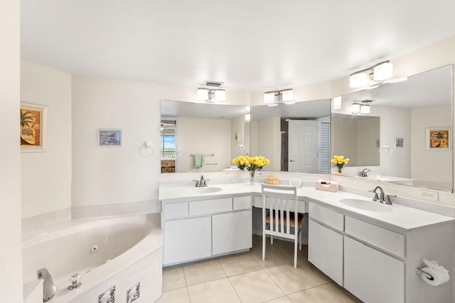 bathroom featuring double vanity, a bathing tub, and tile patterned floors