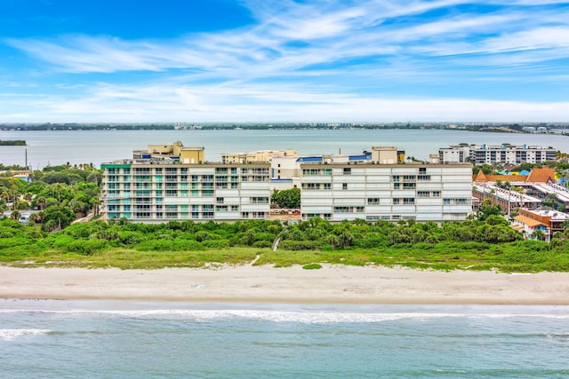 aerial view with a view of the beach and a water view