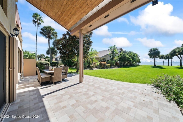 view of patio / terrace featuring a water view