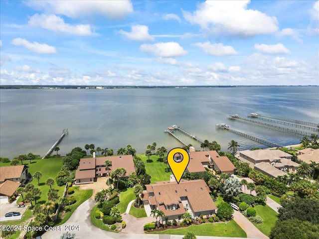 birds eye view of property featuring a water view