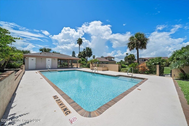 view of swimming pool featuring a patio