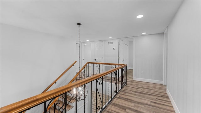 hallway with light wood-type flooring