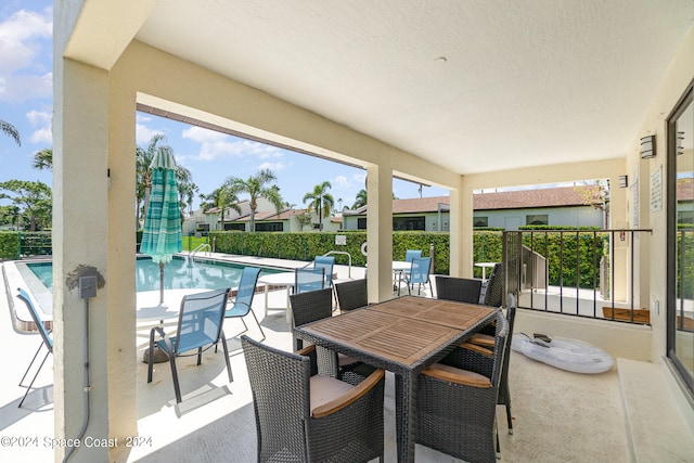 view of patio / terrace with a community pool