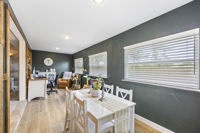 dining area featuring light hardwood / wood-style flooring