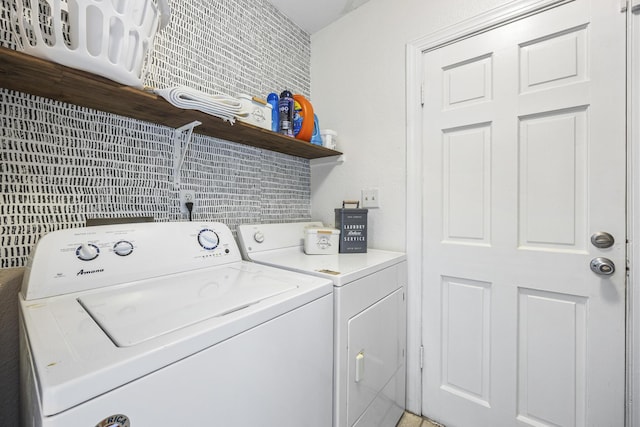 laundry area featuring washing machine and dryer