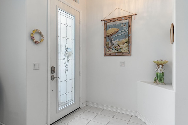 foyer featuring light tile patterned floors