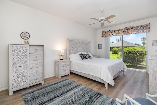 bedroom featuring ceiling fan, access to outside, and hardwood / wood-style floors