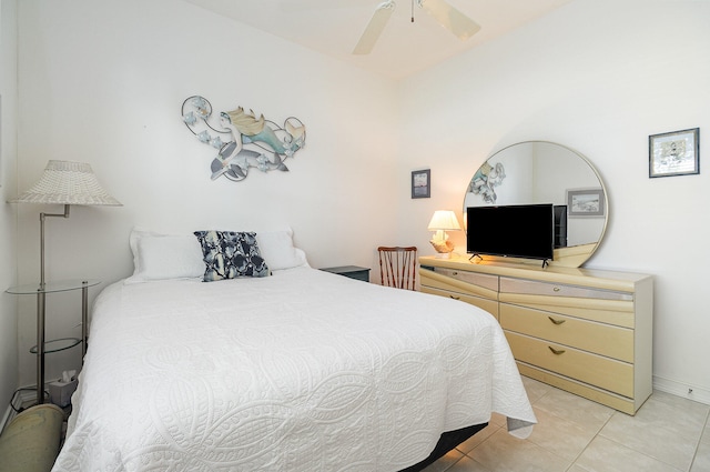 bedroom with light tile patterned floors and ceiling fan