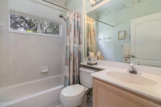 full bathroom featuring vanity, toilet, and shower / bath combination with curtain