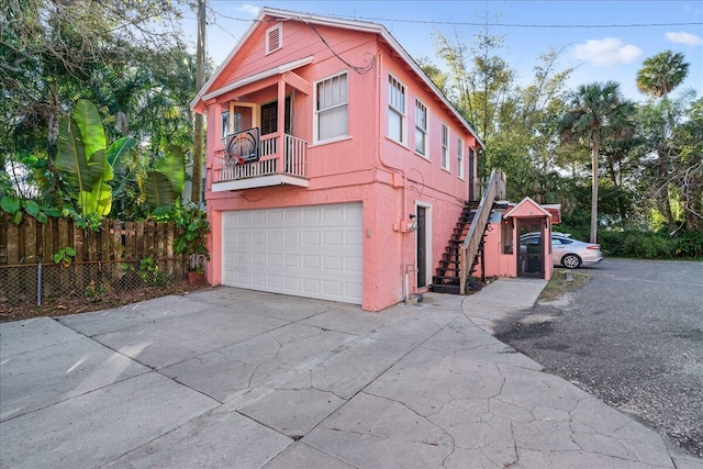 view of property exterior with a garage