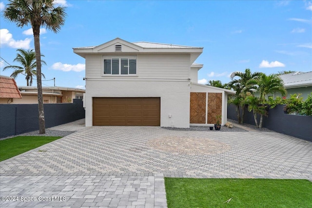 view of front of home featuring a garage