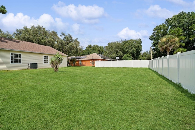 view of yard featuring central AC