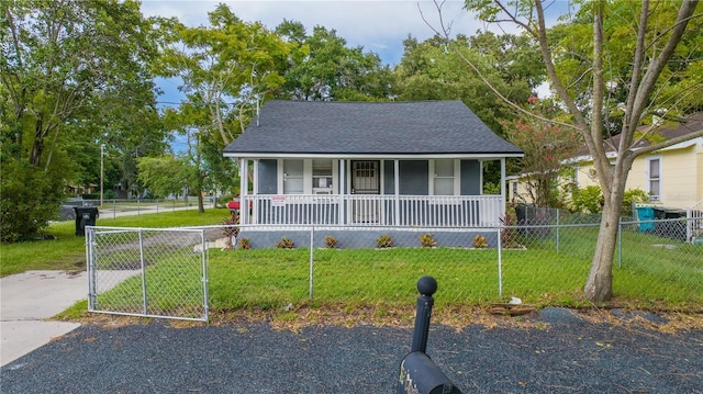 view of front of house featuring a porch and a front lawn