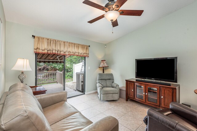 tiled living room with ceiling fan