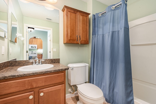 full bathroom with vanity, toilet, and shower / bath combination with curtain