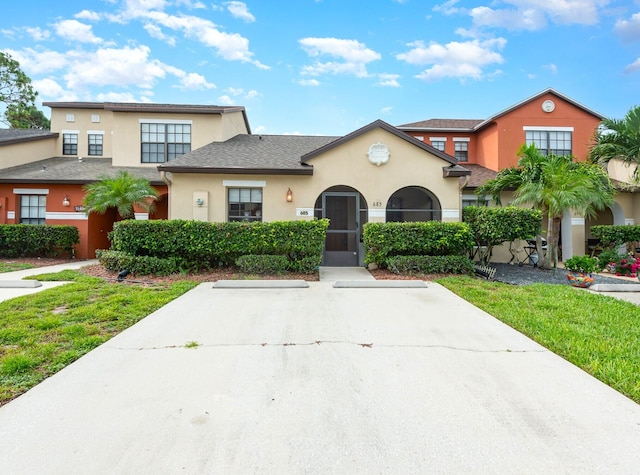 view of front of home with a front yard