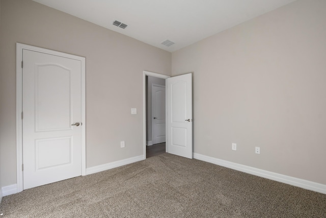 unfurnished bedroom featuring carpet floors