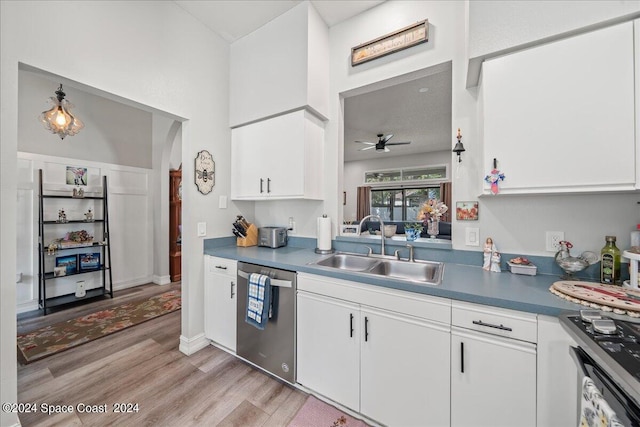 kitchen featuring light hardwood / wood-style flooring, dishwasher, white cabinets, ceiling fan, and sink