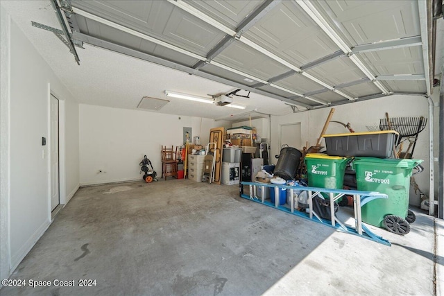 garage featuring a garage door opener