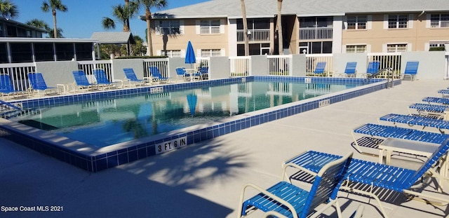 view of pool featuring a patio area