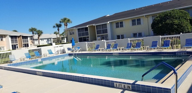 view of pool featuring a patio