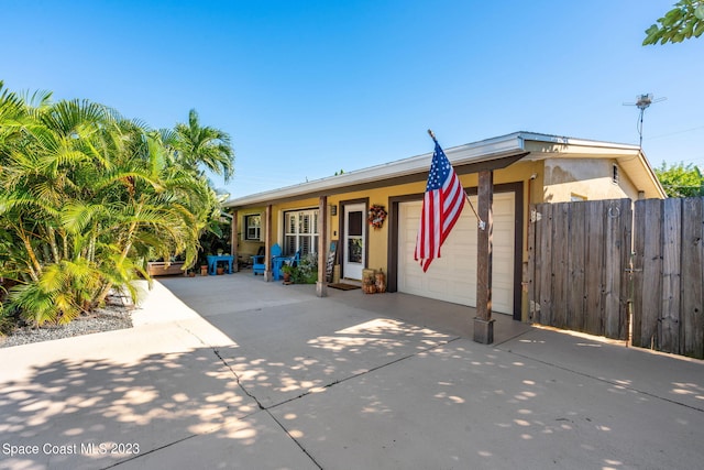 view of front of home with a garage