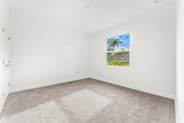 empty room featuring carpet floors