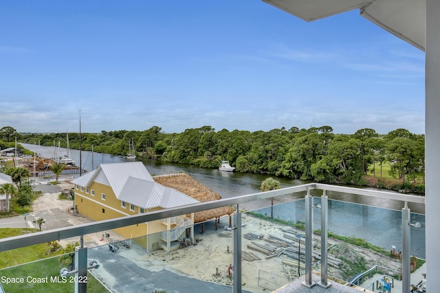 exterior space with a wooded view