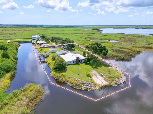 bird's eye view featuring a water view and a rural view