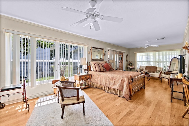 bedroom with light hardwood / wood-style flooring